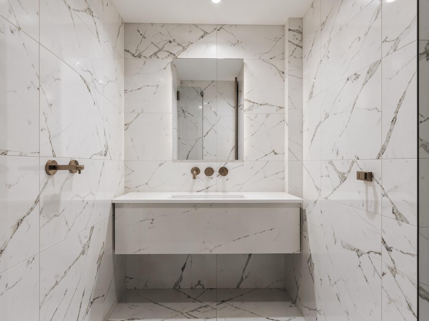 Carrara Bianco tiles installed
